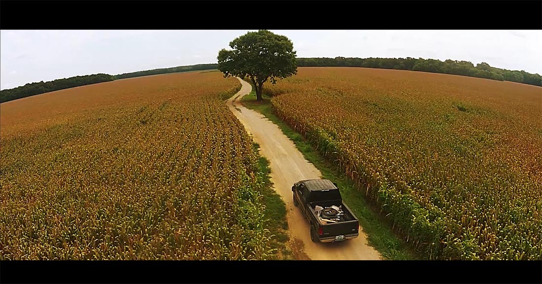 A screen shot from the finished video. Aerial footage at River Rd