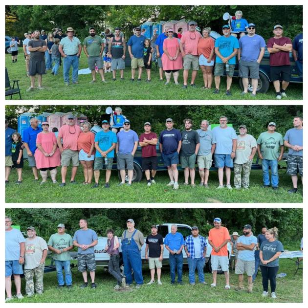 Several of the fishermen who caught tagged catfish.