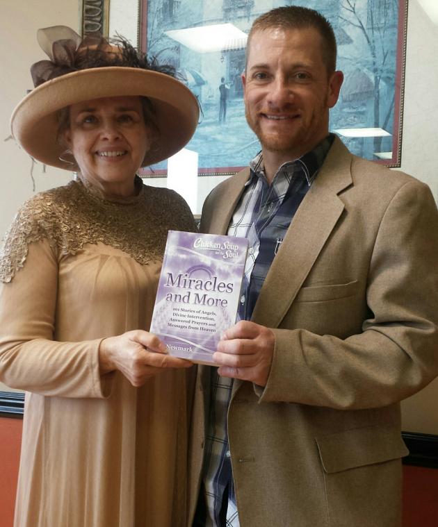  the Author with Man Rescued receiving his copy of Chicken Soup for the Soul, Miracles & More.