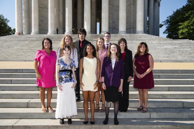 Flanked by Warren RECC chaperones Lori Hardcastle and Stephanie Holland, Warren RECC Washington Youth Tour students (l to r) Kaitlyn Coots, Lila Whittinghill, David Thoma, Aaliyah Sejmenovic, Eleanor Dotson, Owen Adkins, Jana Dickerson and Evelyn Burdette, gathered at the Jefferson Memorial.