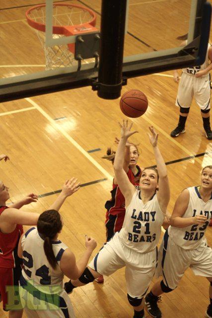 Jazmin Reynolds rebounds the ball.