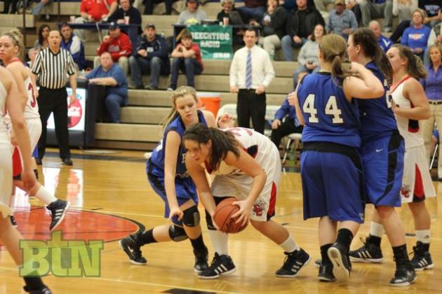 Lady Bears battle for the ball.
