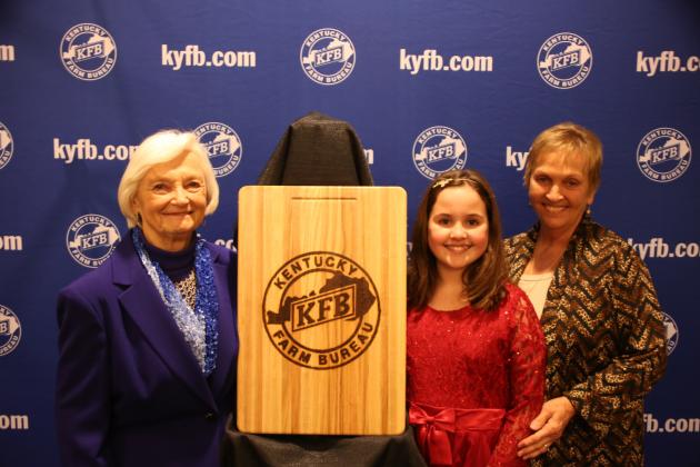  Rita Drake (far right), chair of the Butler County Farm Bureau Women’s Committee with granddaughter Maggie Drake (center), accept the 2016 Gold Star Award of Excellence from Betty Farris (left), chair of the Kentucky Farm Bureau state Women’s Committee.