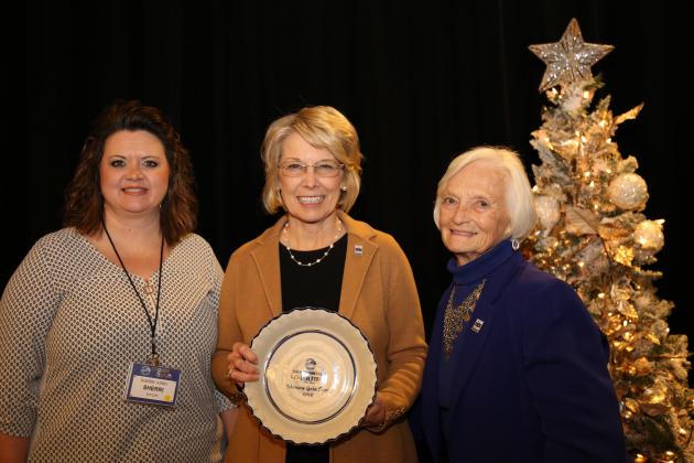 Sherri Kirby & Betty Farris of Butler County Farm Bureau Women’s Committee, accepts the 2019 Gold Star Award of Excellence from Vicki Bryant, chair of Kentucky Farm Bureau state Women’s Committee. The award was presented during a December 6 recognition program at the 100th Kentucky Farm Bureau annual meeting.