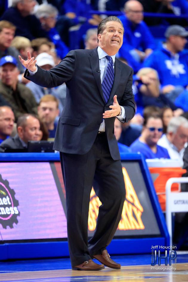 John Calipari always manages to sign a lot of basketballs during his post-game radio show with Tom Leach. (Vicky Graff Photo)