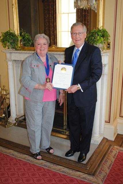 Sen. McConnell congratulates Jefferson Award recipient, Christine Porter Coleman of Morgantown.