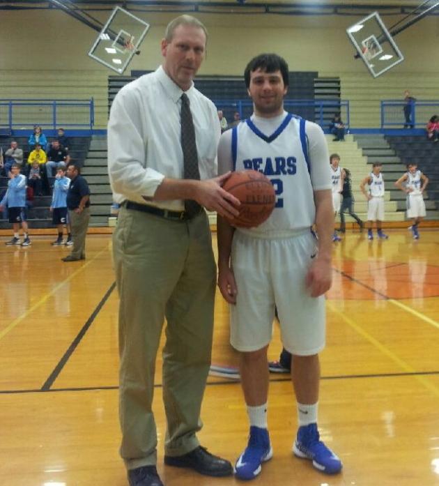 BCHS Basketball coach Calvin Dockery and player Elijah Flener, the newest member of the Bears' 1,000 point club.