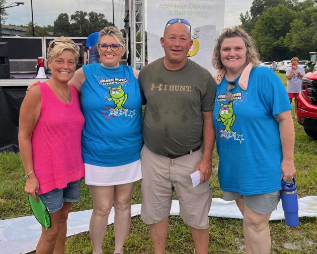 Brian Huckleberry, along with wife Kim, is pictured here with GRCF Fishing Tournament Directors Deena Embry and Dionne Merritt.