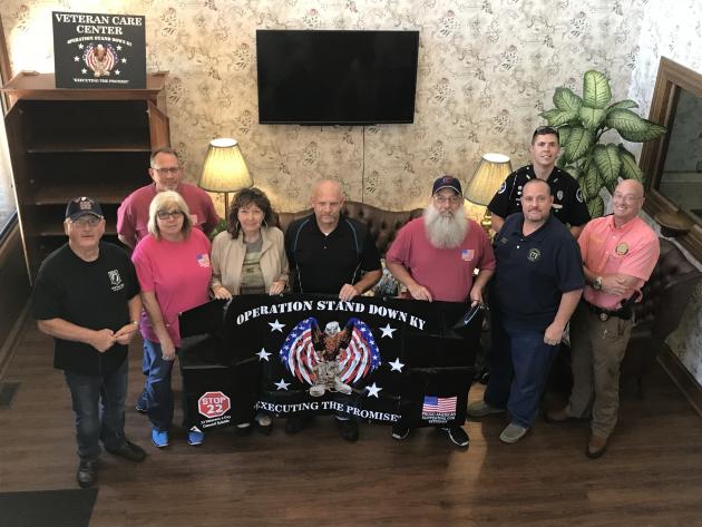 VFW Post 5837 Commander Sharone Nash, Rodney Bont, Penny Bont, Karen Lain, Bob Wilson, Tim Allen, Mayor Billy Phelps, MPD Officer Paul Evans, and Chief Giles Taylor