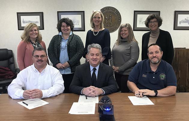 Judge Executive Tim Flener, Superintendent Scott Howard, and Mayor Billy Phelps with School Counselors Hanna Southerland, BCHS; Myra Swift, NBES; Linda Tyree, MES; Bethney Salmon, BCMS; and JoLynn Reed, MES (not pictured, Sherlyn Bratcher, BCHS)