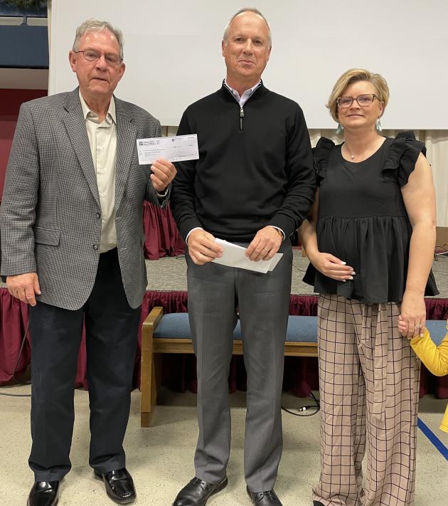 Dion Houchins, CEO of Houchens Industries presents a $15,000 check to Boys & Girls Club of Butler County.L to R: Bruce White, Dion Houchins, and Amamda White.
