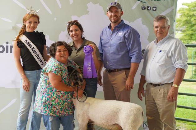 Agriculture Commissioner Jonathan Shell announced Kentucky Department of Agriculture's (KDA) partnership with Special Olympics Kentucky to raise awareness for the Sunshine Class, a class that creates opportunities for special needs youth to get hands-on experience with showing livestock in a show ring. Pictured in front is Kaylee Campbell with Skeeter the lamb at Thursday's announcement. Also pictured, are from left Miss Kentucky Chapel Tinius, KDA intern and Sunshine Class mentor Caroline Groth, Commission