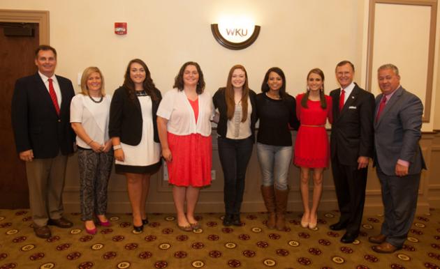  WKU honored five students from Butler County High School on Oct. 14. From left: Michael Gruber, counselor Hanna Southerland, Alison Kurfiss, Brittney Gruber, Emily Rich, Brittany Qualls, Haley Adkins, WKU President Gary Ransdell, superintendent Scott Howard. (WKU photo by Clinton Lewis)