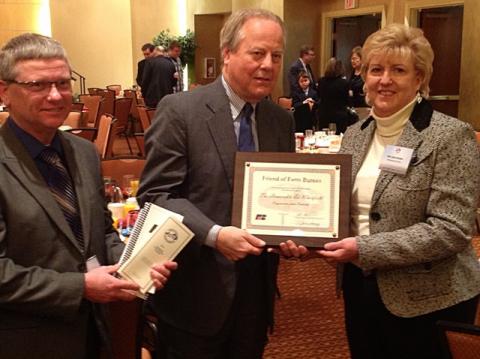 Danny Wilkinson (left), Congressman Ed Whitfield (center), and Mary Kate Kordes (right) presenting Whitfield with American Farm Bureau Federation's "Friend of Farm Bureau" Award.
