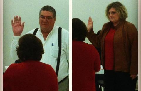 Allen Meredith and Dionne Meritt take the oath of office.