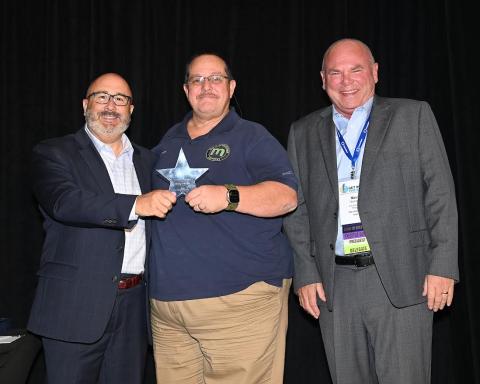KLC Executive Director/CEO J.D. Chaney and Immediate Past President and Auburn Mayor Mike Hughes recognize Morgantown Mayor Bill Phelps as a Certified Municipal Officer.