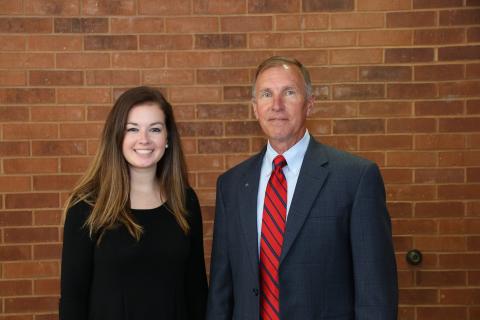 Jessica Camp (left) is greeted by Dwight Greenwell, Kentucky Farm Bureau Director of Member Services (right), during the 2017 Institute for Future Agricultural Leaders (IFAL) at Murray State University.   
