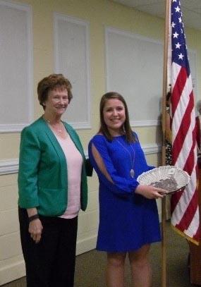 Jane Smith presents Emily Wallace with the Good Citizen Award.