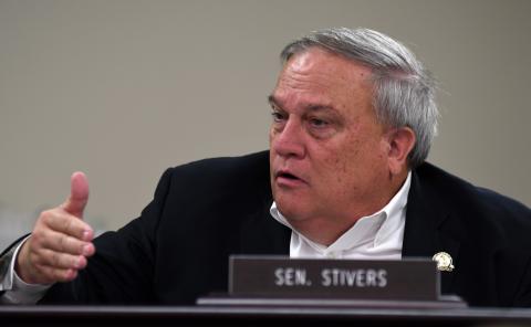 A photo from Thursday’s Interim Joint Committee on Judiciary meeting can be found here. It shows Senate President Robert Stivers, R-Manchester, asking a Tennessee state representative a question.