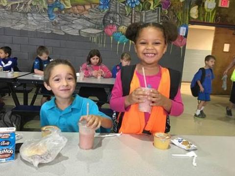 MES 1st grader Denzil Burden and MES kindergarten Nevaeh O’Neal enjoying smoothies on kickoff day.