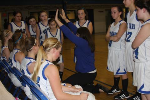Coach Lexie Smith and the seventh grade girls.