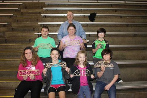2018 Bridge Building Team L-R: First Row -Savannah Coin, Taylor Leach, Brooklyn Smith, Jayden Jenkins; L-R: Second Row - Caleb York, Lita Litten, Jameson Findley: Top Row - Bridge Building Coach Dennis McCrocklin