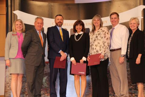 From left are: Dr. Donna Hedgepath, vice president for academic affairs; Scott Howard, superintendent; James Felty, Jr., North Butler Elementary School; Holly Elmore, Butler County Middle School; Joanna Embry, Butler County High School; Michael Gruber, principal, Butler County High School; and Dr. Beverly Ennis, dean of the Campbellsville University School of Education. (Campbellsville University Photo by Drew Tucker)