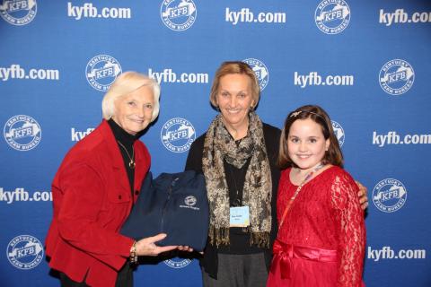 Rita Drake (center), chair of the Butler County Farm Bureau Women’s Committee and Maggie Drake (right), accepts the 2015 Gold Star Award of Excellence from Betty Farris (left), chair of the Kentucky Farm Bureau state Women’s Committee