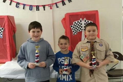 This year’s Pack 208 winners were: (Above, left to right) 1st Place Wesley Phelps, average time 2.5510 seconds; 2nd Place Dalton Hale, average time 2.6050 seconds; 3rd Place Nicholas Campbell, average time 2.6330 seconds.