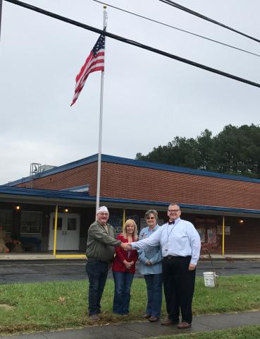 Pictured is Post Commander, Sharone Nash, Auxiliary President Sherry Webster,  Americanism Chairman Lynda Knight, and MES Principal Chad Flener.