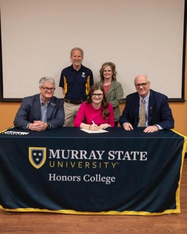 Delaney Daugherty along with officials from Murray State University.