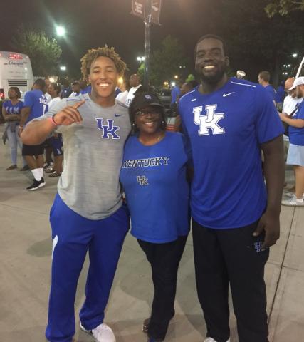 DeDe Haynes, center, was all smiles with her son, Nick (right), and running back Benny Snell  Jr. after UK’s win at South Carolina. Now she’s expecting a win over Florida this week. 