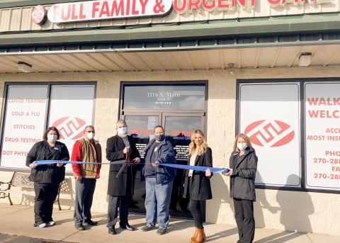 Cutting the ribbon to officially open Full Family & Urgent Care are, from left, Medical Assistant Amber Embry, Butler County Judge Executive Tim Flener, Owner Dr. Chris Fuller, Morgantown Mayor Billy J. Phelps, Chamber Executive Director Tristan Klein and Nurse Practitioner Susan Hicks, MSN, APRN, FNP-C. hoto credit: Dana Phelps)