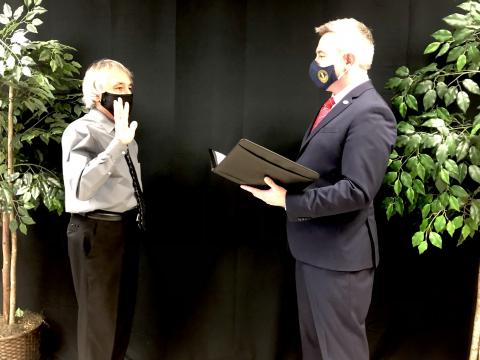 Stevie Givens being sworn in by Ryan Quarles
