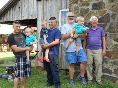 Left to right are Brian of Jacksonville, NC and son Andrew, Nick of Bowling Green holding his son Gavyn, John of Bowling Green with Andrew's twin Silas, and Charles Hutcheson of Morgantown.  