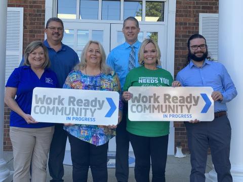 Judge Tim Flener, Supt. Robert Tuck, Dr. Amy Hood Waddle, Deborah Hammers, Amy Smith-Thomas, and Jacob McAndrews