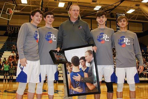 The senior Bears presented Coach Calvin Dockery with a framed photo.