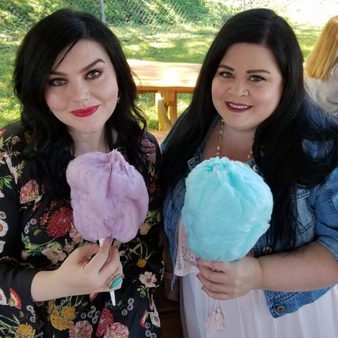 Cassie and Leslie enjoying some cotton candy.