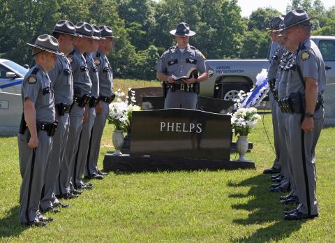Kentucky State Police Post 3 personnel at the grave of Trooper Darrell Vendl Phelps. 