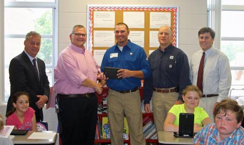 Supt. Howard, Principal Chad Flener, Travis Vincent, Bill Mills, and Mr. Harrison.