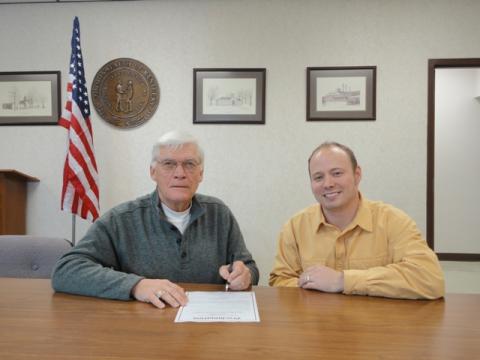 Judge-Executive David Fields and Adam Massey