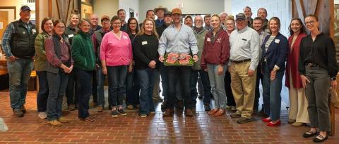Commissioner of Agriculture Jonathan Shell, center, was surrounded by Kentucky beef industry personnel and producers as he celebrated May as Beef Month in Kentucky at The Yards in Lexington. The Yards, in the Blue Grass Regional Stockyards Marketplace, is an education center focusing on science and practices of the beef industry. (Kentucky Department of Agriculture)
