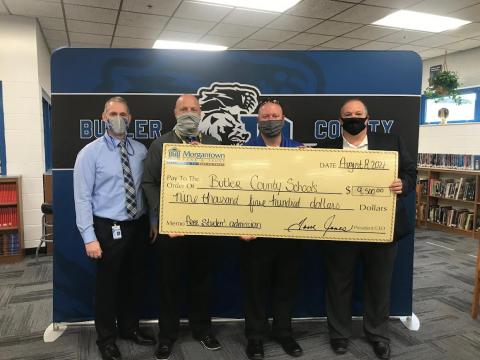 Supt. Robert Tuck, BCHS Principal Stoye Young, BCMS Principal Tim Freeman, and Jason Jones, EVP of Morgantown Bank & Trust