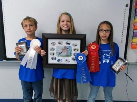 NBE Winners:  1st Place- Jaelyn Taylor (middle);  2nd Place- Andi Hawkins (right);  3rd Place- Austin Cardwell (left)