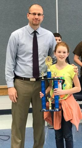 North Butler Elementary Principal Josh Belcher and Spelling Bee Winner Briley Webster