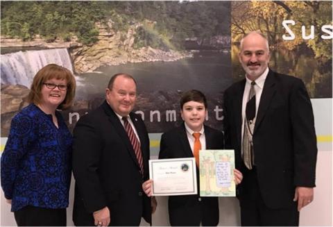 Blake Bratcher is pictured with Kim Richardson, KY division of Conservation, Mark Haney, KY Farm Bureau President, and David Rowlett, Ky Assoc. of Conservation Districts during a ceremony in Frankfort that included a guided tour of the Capitol