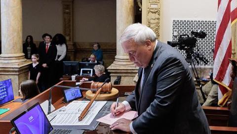 Senate President Robert Stivers, R-Manchester, signs House Bill 1, priority legislation to reduce Kentucky’s income tax rate.