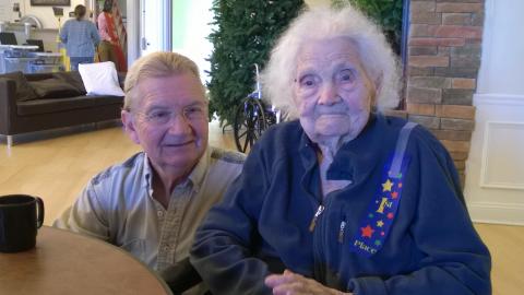 Lillie McKinney with her son, Bobby McKinney, celebrating Lillie's 103rd birthday at Morgantown Care and Rehab Center.