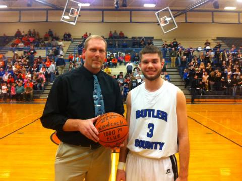 Butler County's Zeke Woodcock passed the career 1,000 point mark recently against Breckinridge; he was honored by Coach Calvin Dockery prior the last week's game against Grayson County.