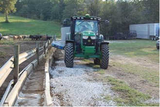 Danny Farris farm feeding cattle at TMR.    Photo by Greg Drake II